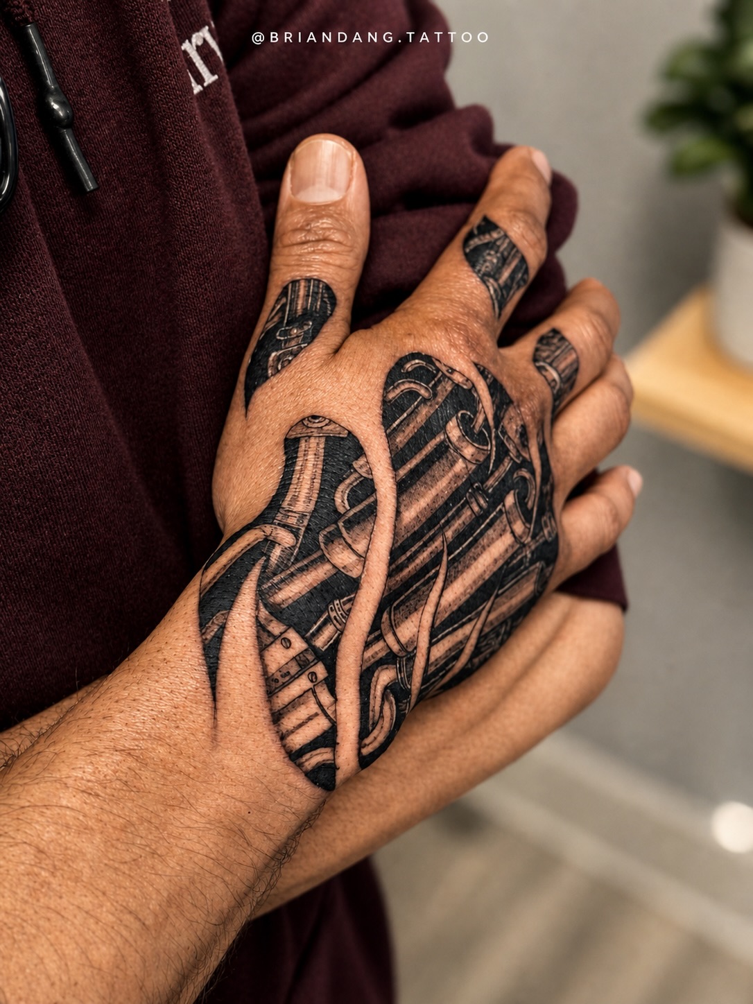 Biomechanical hand tattoo