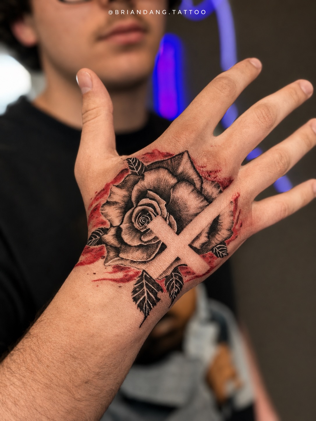 Rose hand tattoo