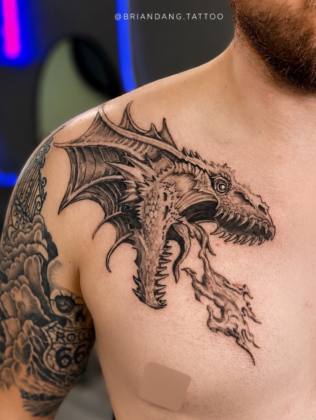 Dragon chest tattoo