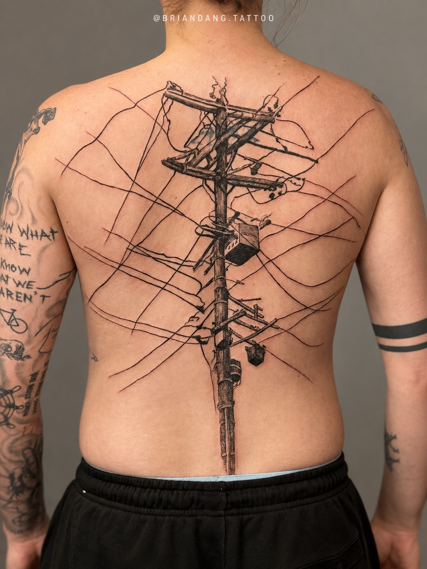 Power line back tattoo